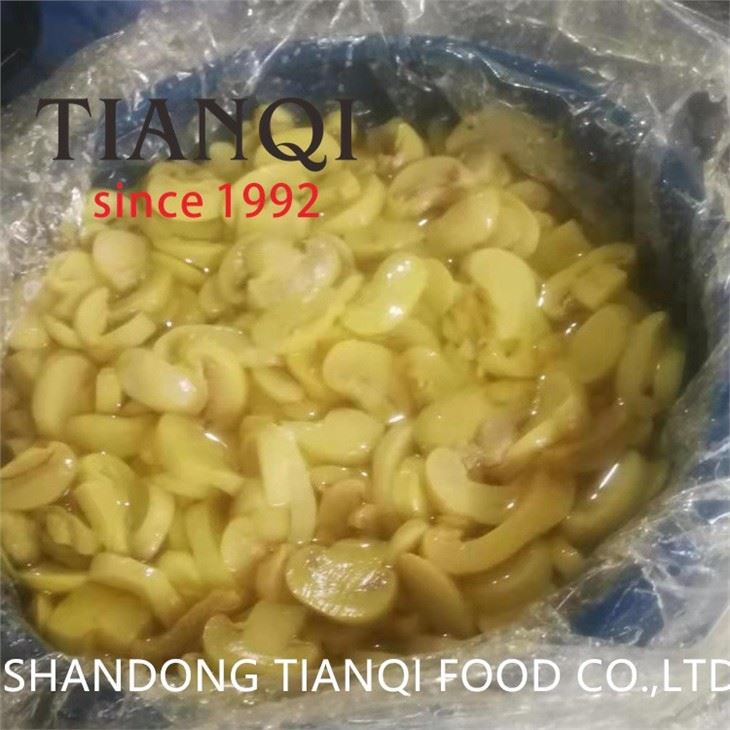 Preserved Sliced white champignon mushroom in drums